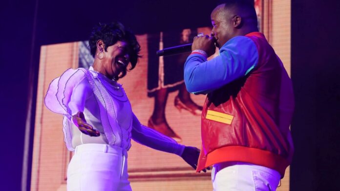 Yo Gotti with his mother parents